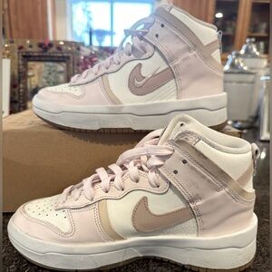 Nike shoes. Women’s size 5.5.  Pink & white. Used.